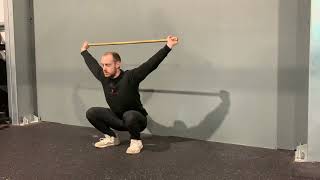 Snatch sotts press (dowel warm up) demonstration